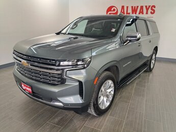 2023 Silver Sage Metallic Chevrolet Suburban Premier 4 Door SUV 4X4