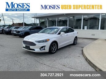 2020 White Platinum Metallic Tri-Coat Ford Fusion Hybrid Titanium Automatic (CVT) I4 Hybrid Engine FWD Car 4 Door