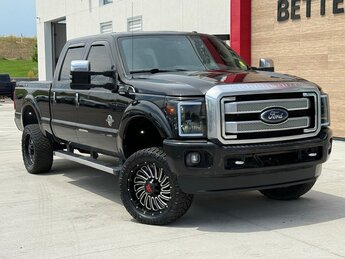 2014 Tuxedo Black Metallic Ford Super Duty F-350 SRW Lariat 4 Door Power Stroke 6.7L V8 DI 32V OHV Turbodiesel Engine 4X4 Truck