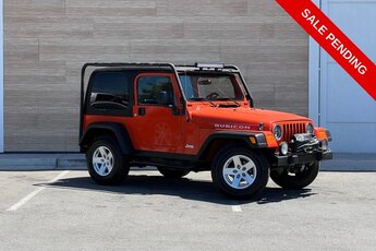2006 Impact Orange Jeep Wrangler Rubicon PowerTech 4.0L I6 Engine Manual 4X4