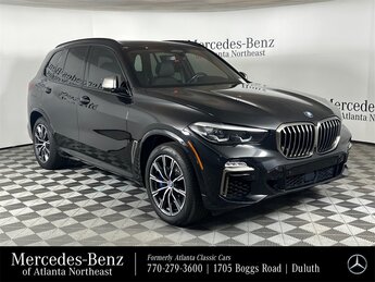 2020 Black Sapphire Metallic BMW X5 M50i Automatic 4 Door AWD 4.4L V8 DOHC 32V Twin Turbocharged Engine