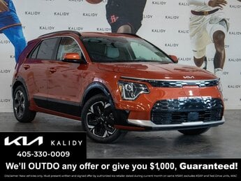 2023 Fire Orange Kia Niro EV Wind Automatic 4 Door SUV