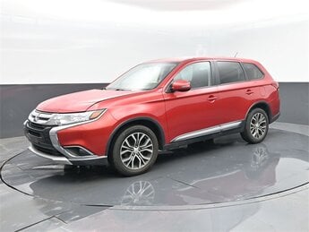 2016 Rally Red Metallic Mitsubishi Outlander SE Automatic (CVT) 4 Door SUV 2.4L I4 SOHC Engine 4X4