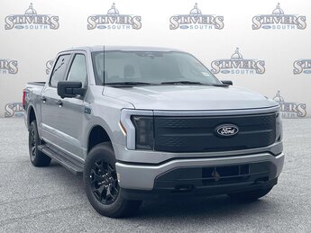2025 Silver Ford F-150 Lightning XLT AWD Automatic 4 Door Truck