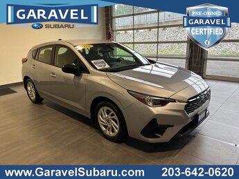 2025 Ice Silver Metallic Subaru Impreza Base Automatic (CVT) AWD 2.0L DOHC Engine 4 Door Crossover